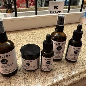 Oliveda Skincare Set - open and/or Used. See photos.  Great price for set.